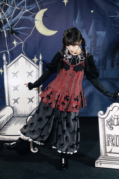 ドラキュラチェックノースリーブトップス