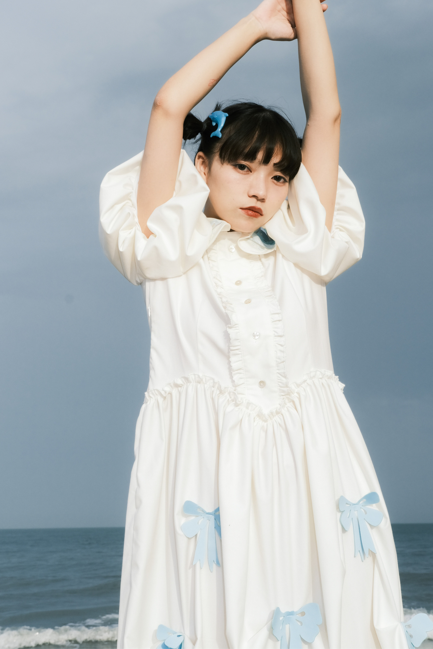 Prinzessinnenkleid mit Ballonärmeln und Schleife