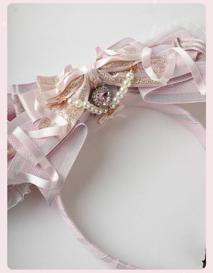 ロリータピンクの大きなリボンビーズチェーンとハートチャームレーストリムKC