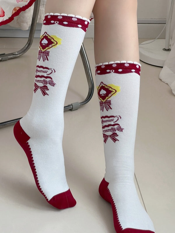 Weiße Lolita-Wadensocken mit Schleifenmuster und Rüschenbündchen