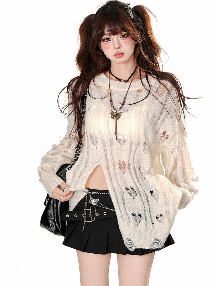 アプリコットのハート型、ダメージ加工の穴あきセーター（裾はシュレッド）