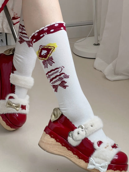 Weiße Lolita-Wadensocken mit Schleifenmuster und Rüschenbündchen