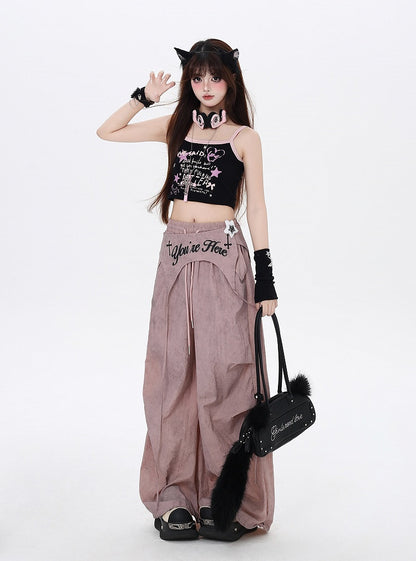 非対称のダスティピンクのドローストリングウエストのアクセサリーパンクパンツ、ウェイストランドウエスト
