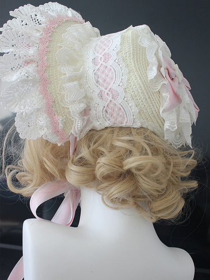ピンク/ブルーの花柄リボンディテール、レーストリムのボンネット