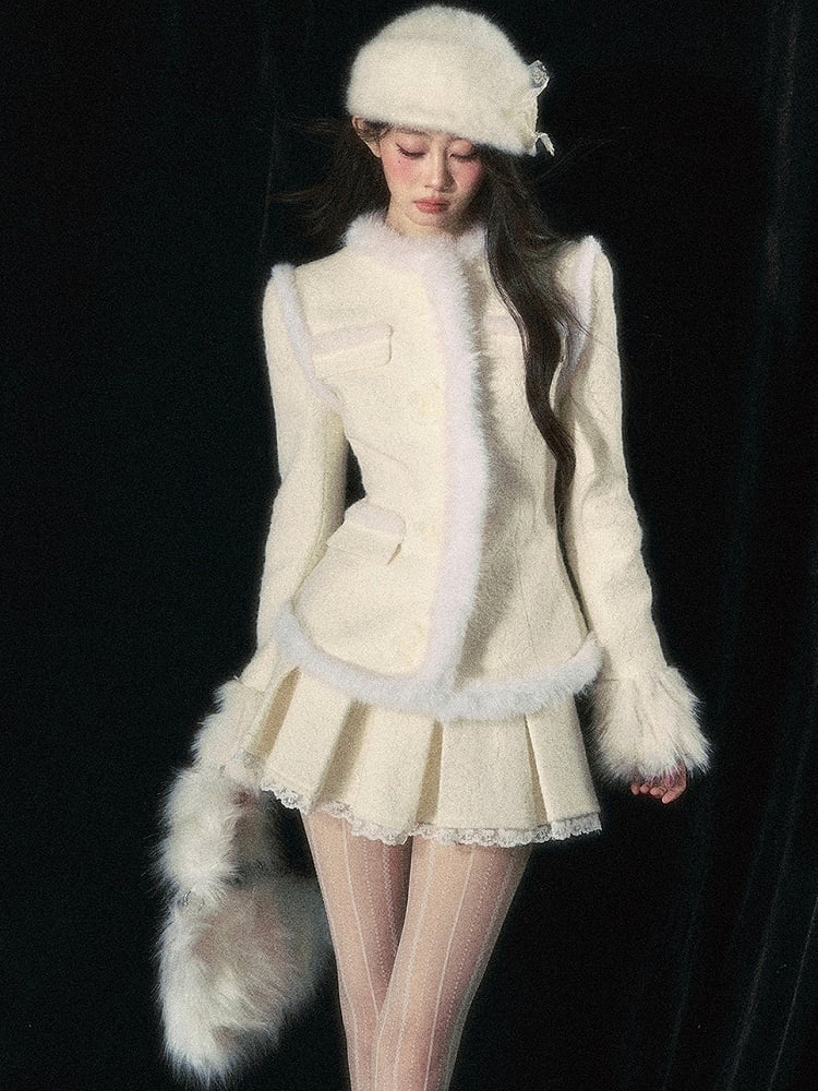 Aprikosenfarbener Jacquard-Rock aus Wolle mit Kellerfalten und Spitzenbesatz