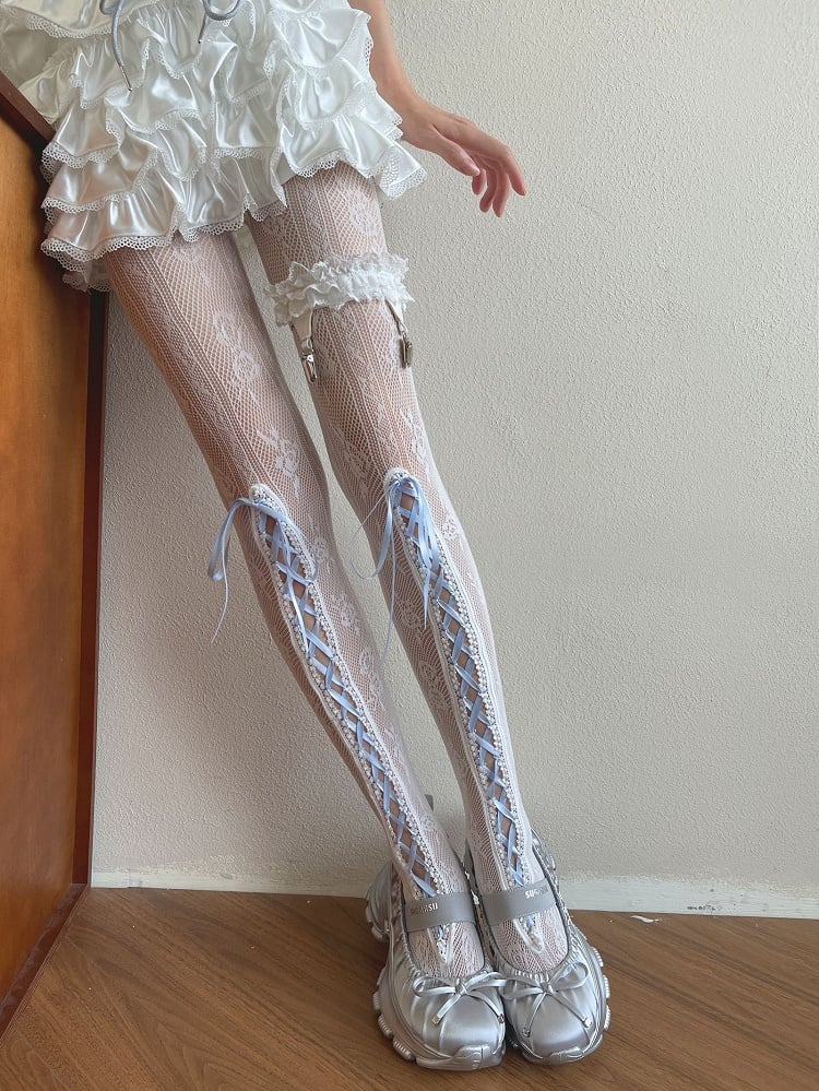 Strumpfhose mit Blumenmuster in Blau mit Lochmuster und Schnürdetail