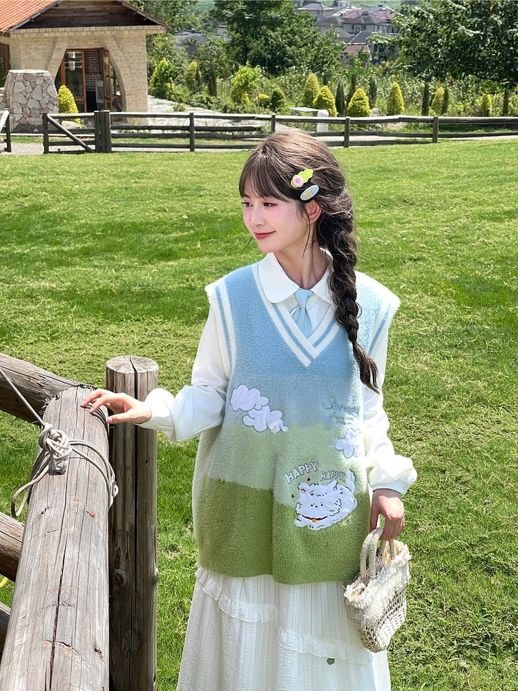 ブルー＆グリーングラデーションの子犬柄ニットベスト