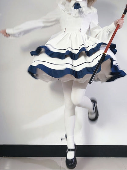 Weiß-blaues Stufenkleid mit Hemdkragen, Rüschenbesatz und Krawatte