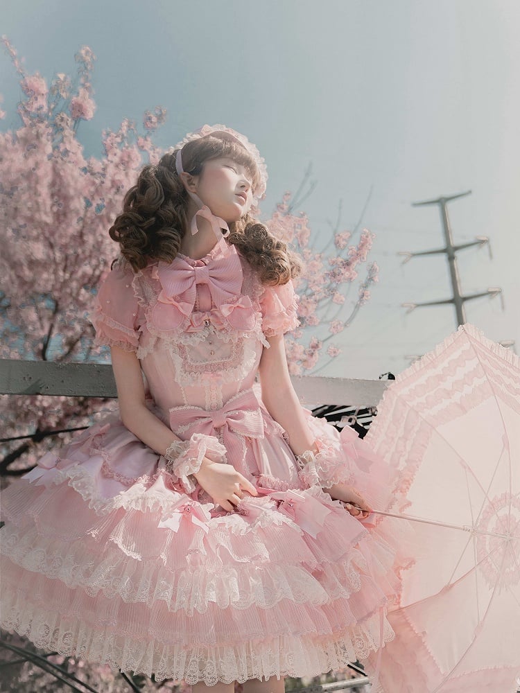 ピンクの取り外し可能な蝶結びネックラインビーズショートパフスリーブブラウス