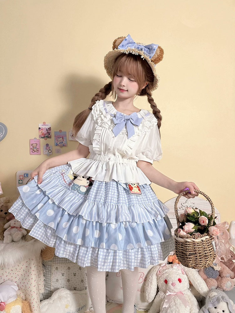 ブルーの蝶結び、水玉模様の袖、取り外し可能なブラウス付きのホワイトのショートパンツ