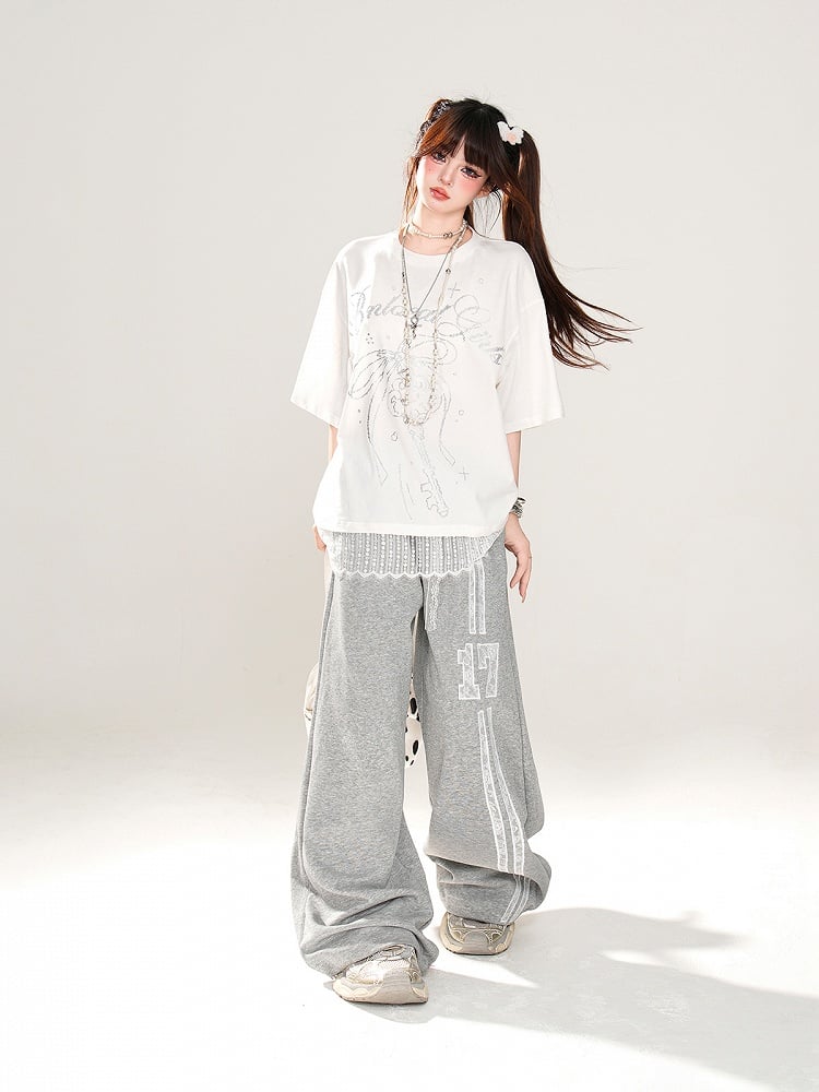 T-Shirt Loose Blau/Weiß Schlüssel- und Schleifendruck Spitzenbesatz