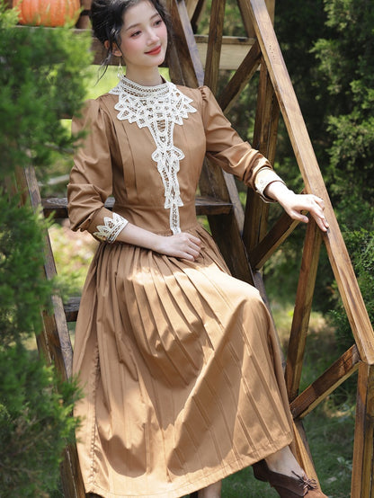 Braunes Vintage-Kleid mit Stehkragen und langen Puffärmeln