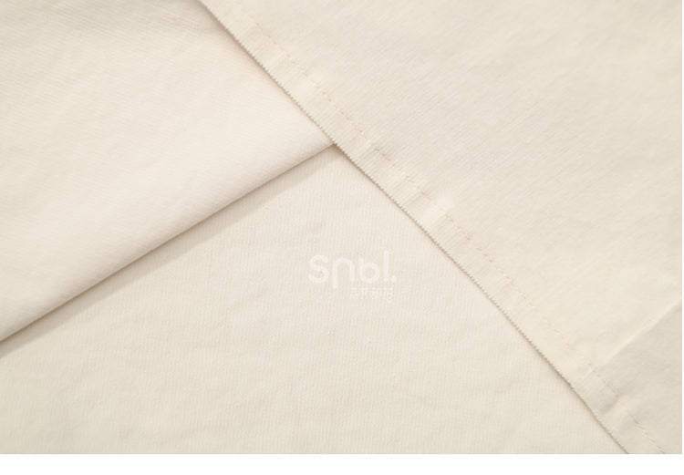 アプリコットラウンドネックブラウス