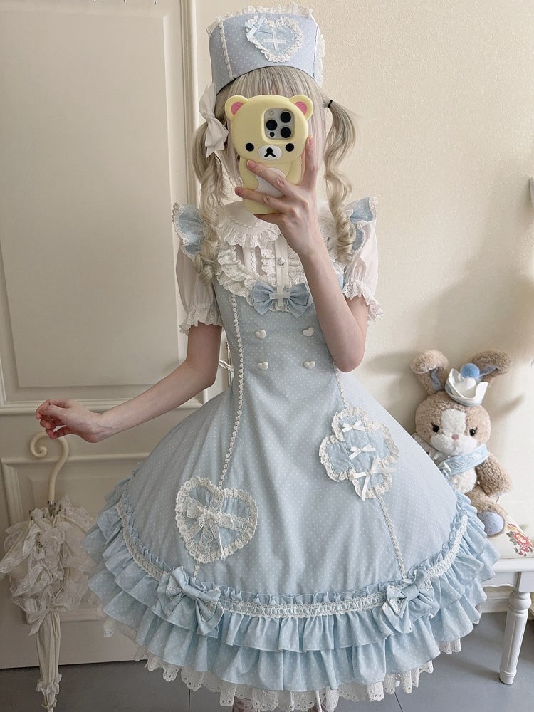 Blaues Lolita-Kleid mit Rüschensaum und Lagenmuster und Polka-Dot-Muster