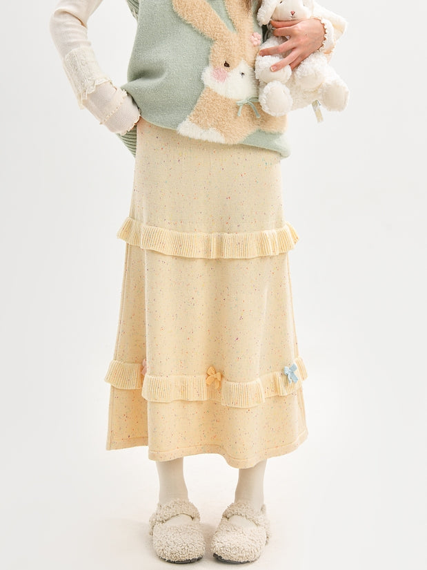 イエローのリボンがアクセントのハイウエストニットミディ丈スカート