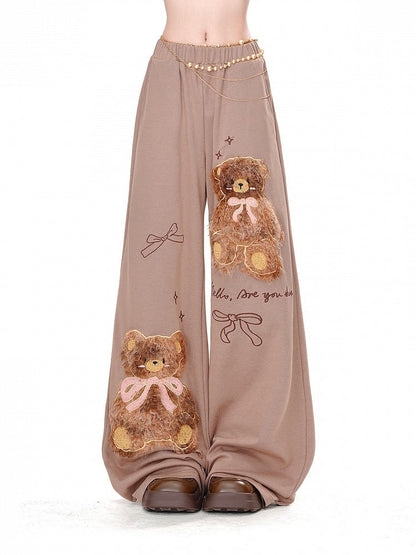 Braune, lockere Hose mit weitem Bein und Teddybär-Schleifendetail aus Plüsch