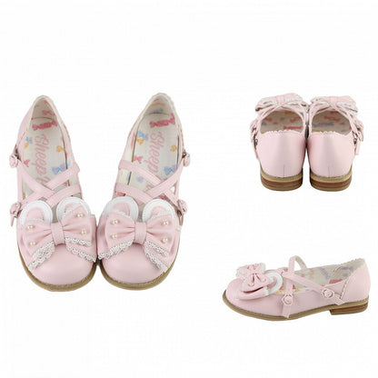 Rosa Ohrstecker mit Hasenschleife, kreuz und quer mit Perlen verziert