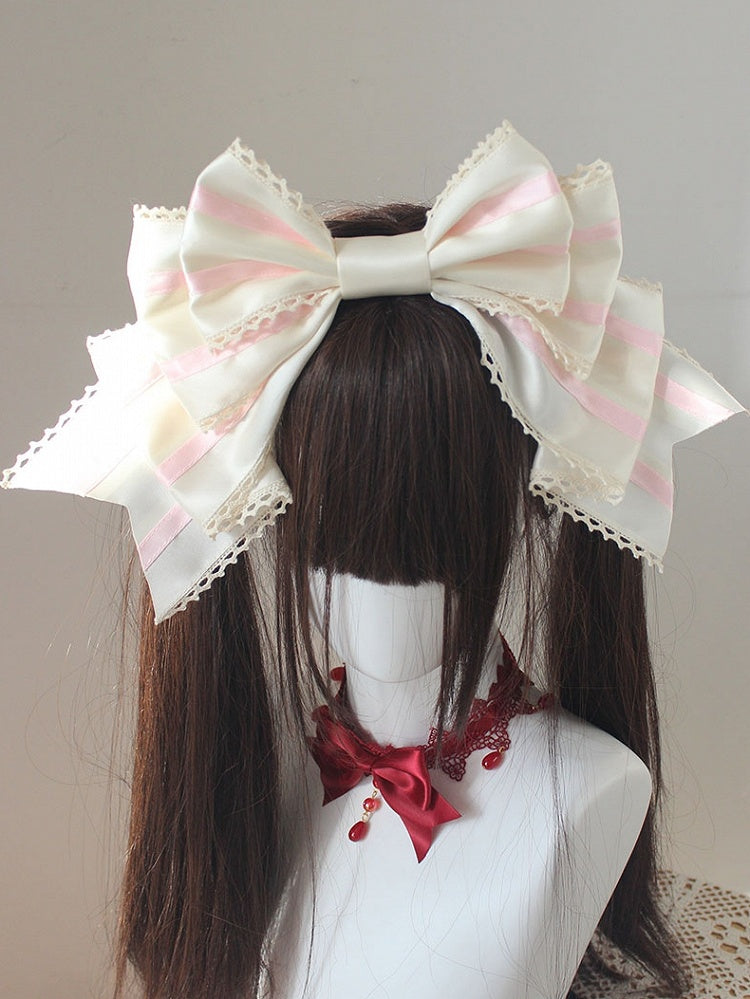 ピンクと白のストライプ柄の大きなリボンKC