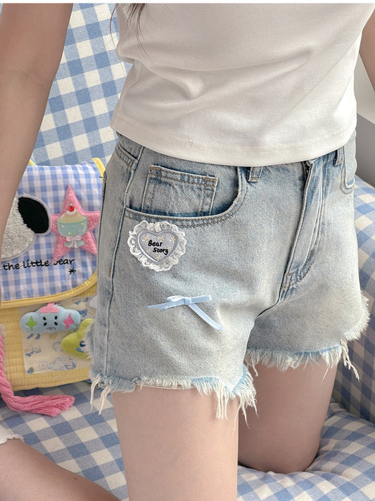 ヴィンテージデニムショートパンツ ブルー 切りっぱなし裾 ハートアクセント ライト