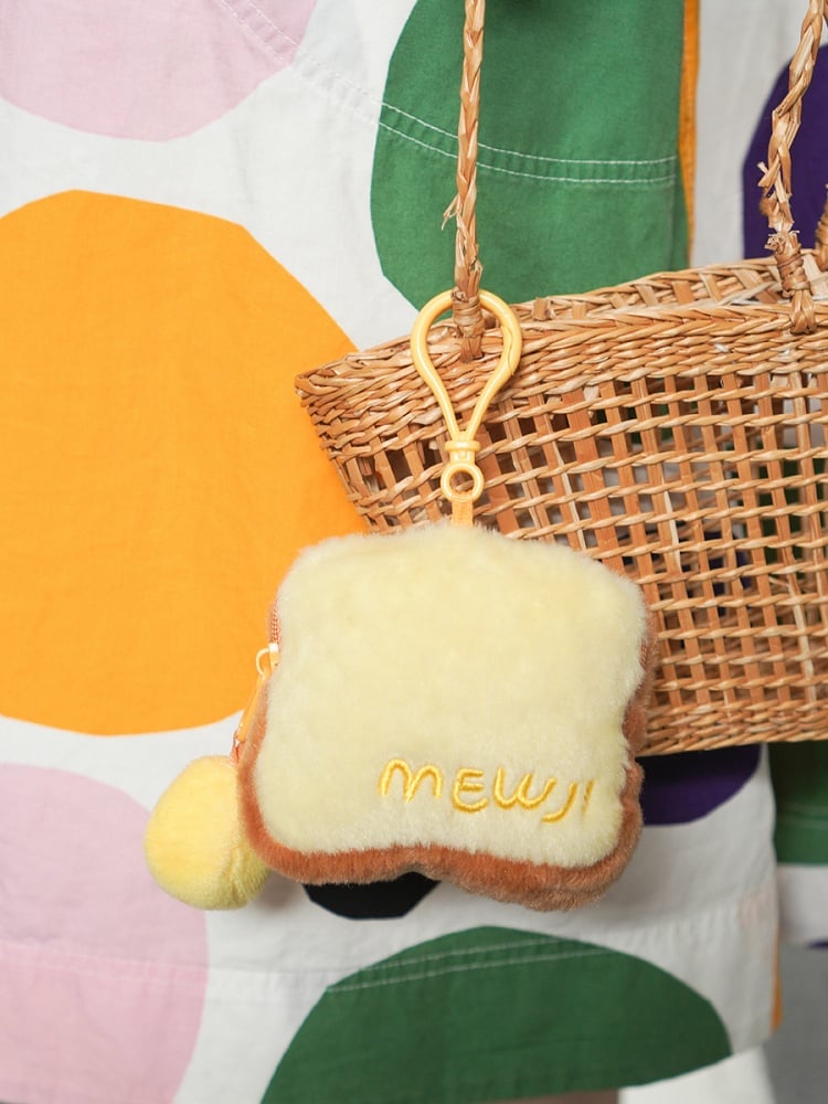 かわいいキティ柄のイエロー＆ブラウンの漫画風コインケース