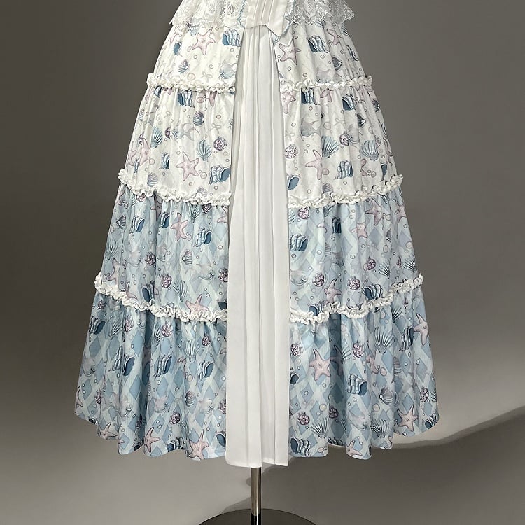 Blaues Lolita-Muschelkleid mit weißem Meeresdruck und Seesternen