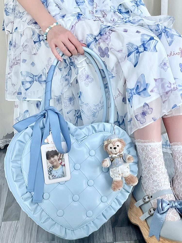 Handtasche in Herzform und Steppraute mit blauen Lolita-Kanten und Rüschen