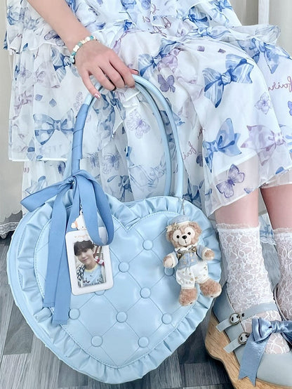 Handtasche in Herzform und Steppraute mit blauen Lolita-Kanten und Rüschen