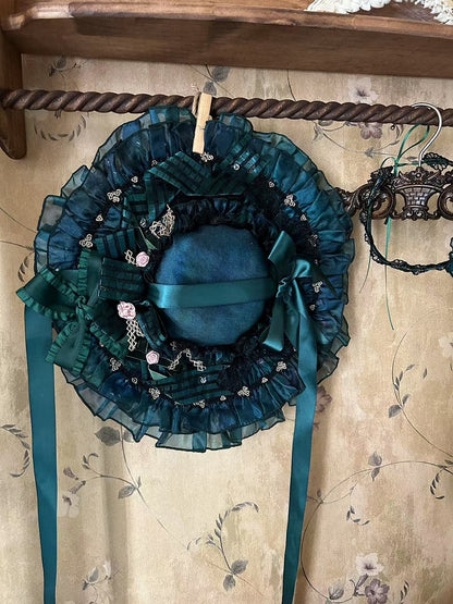 緑の蝶結びと花飾りのロリータ帽子