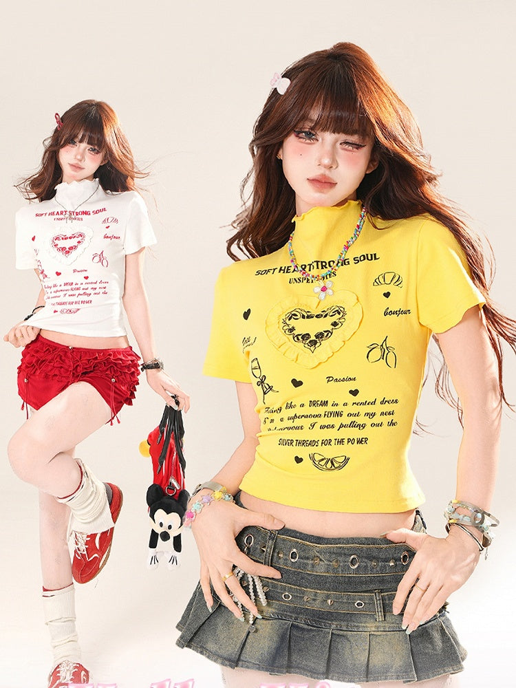 ホワイト/イエロー ハイネック フリル ハート グラフィック Tシャツ