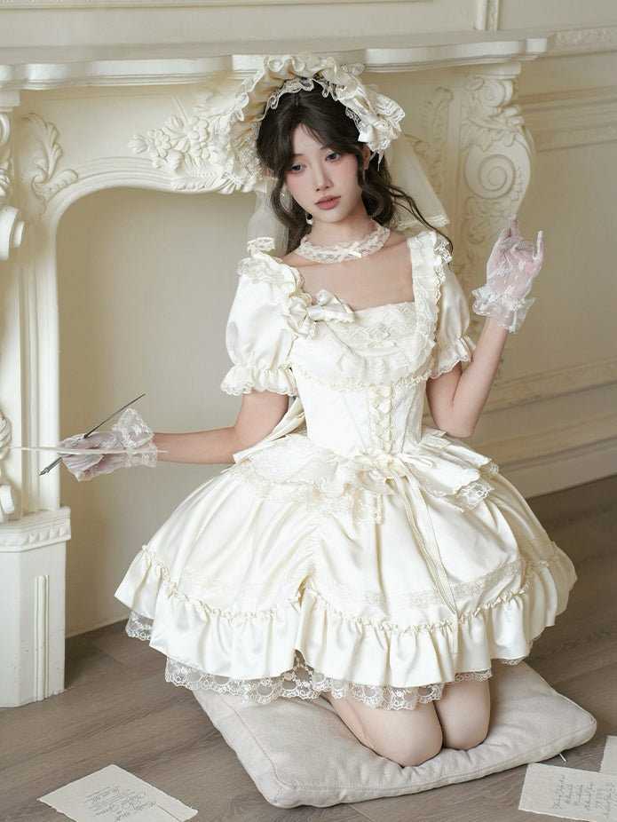 Beige Brosche mit Schleife