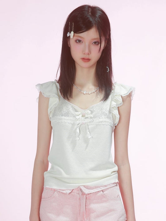 リボン結びのホワイトフラッタースリーブトップス