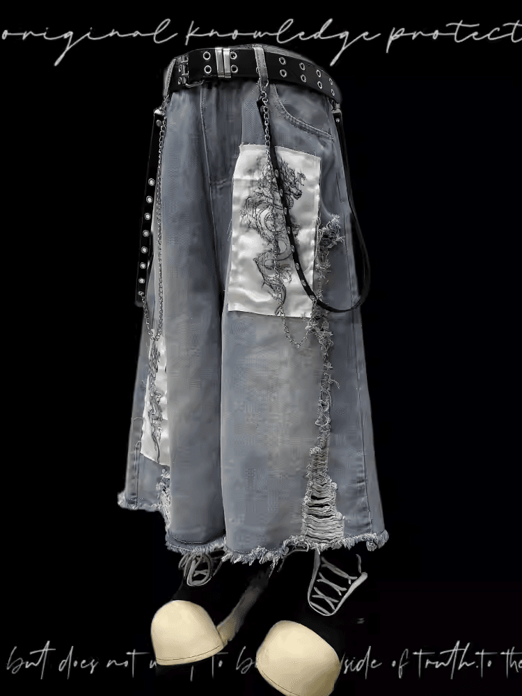 ブルーのワイドレッグジーンズ、ドラゴンのアップリケ、切りっぱなしの裾、ダメージ加工の穴、ライト