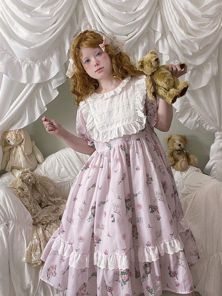Rosa Hauskleid mit Puffärmeln und Blumendruck