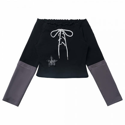 Schwarzes Top mit schulterfreiem Ausschnitt, Stern-Applikation und Schnürdetail