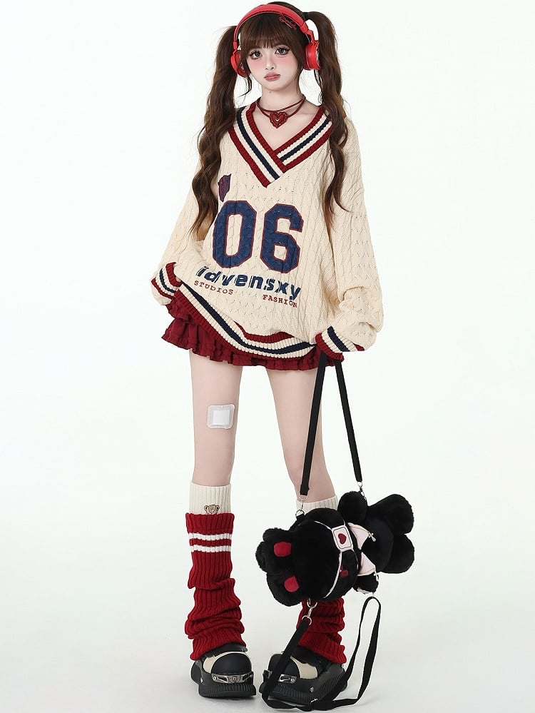 Apricot Preppy Loose Sweater mit Zahlen und Buchstaben