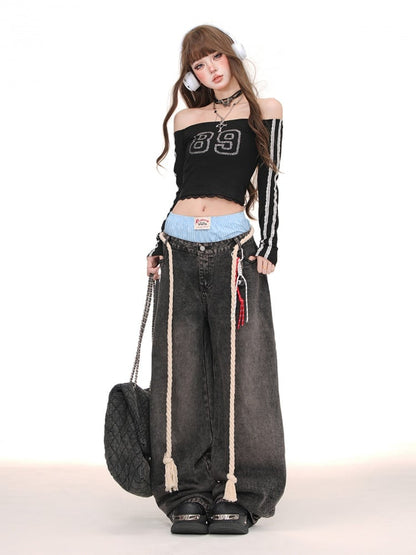 Weit geschnittene Jeans mit gestreiftem, kariertem Bund