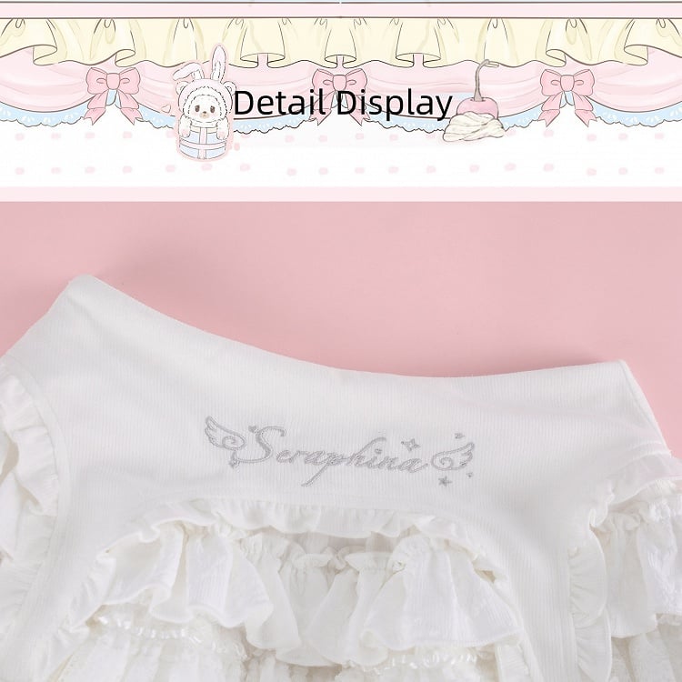 Layered White Ruffle Mini Skirt with Cross Accent & Lining - serendipity