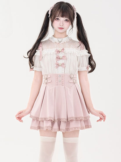 蝶結びのショート丈ジライラインストーンシャツプリーツピンクのディテール袖装飾ケイハート