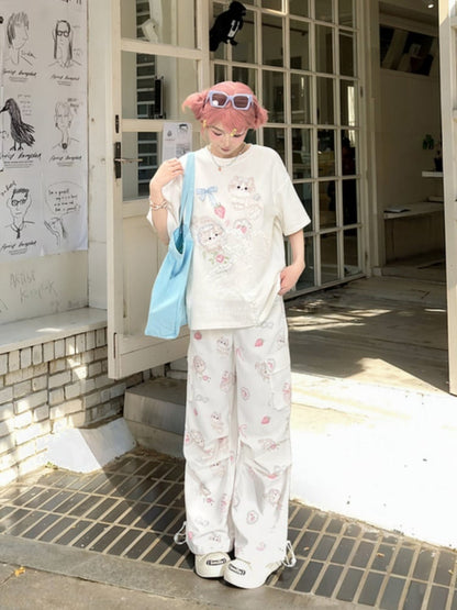 Cuffs – Entzückende weiße Hose mit weitem Bein und Cargotaschen mit Kitty-Print und Kordelzug