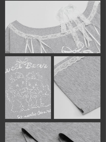 Graues Top mit asymmetrischem Ausschnitt und Cartoon-Spitzenakzenten