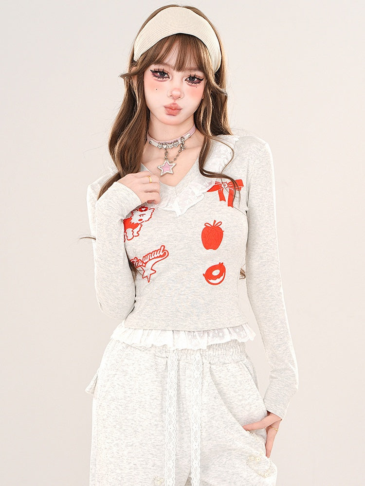 Schwarz/Graues Cartoon-Top mit V-Ausschnitt und Spitzenbesatz