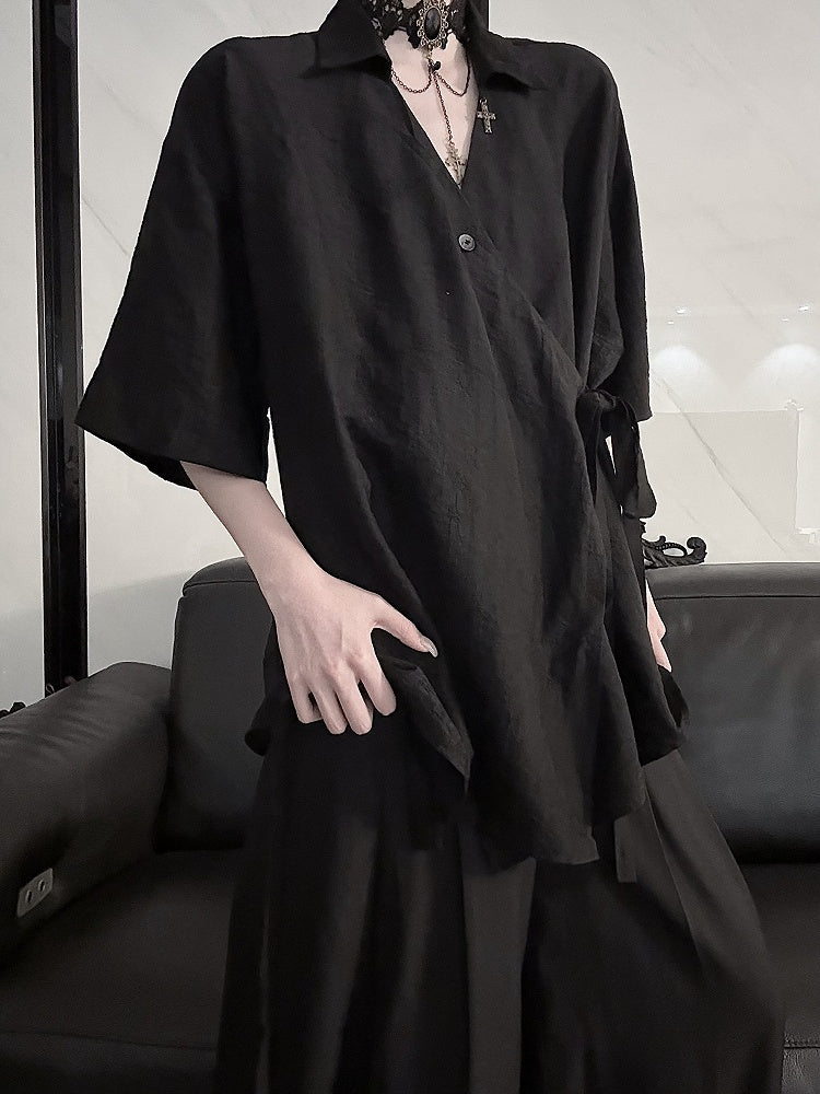 Cheongsam noir à manches courtes et style chemise