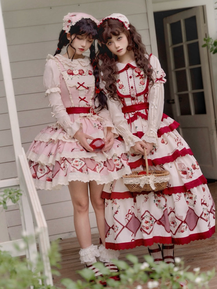 ピンクと赤のリンゴ柄の三角スカーフ