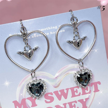 Jirai Kei-Ohrclips mit Pompons und Strassdetails