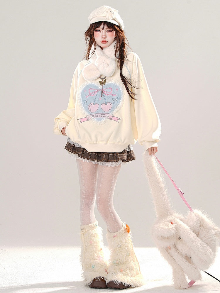 Aprikosenfarbenes, lockeres Sweatshirt mit Spitzenbesatz und Herzapplikation