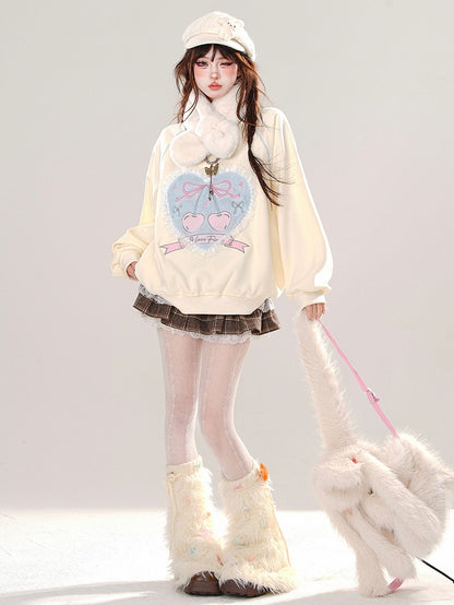 Aprikosenfarbenes, lockeres Sweatshirt mit Spitzenbesatz und Herzapplikation