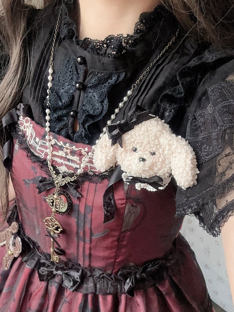 Cremefarbene Fleece-Pudelbrosche