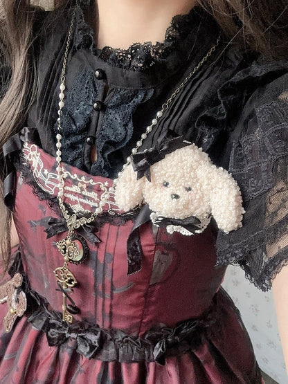 Cremefarbene Fleece-Pudelbrosche