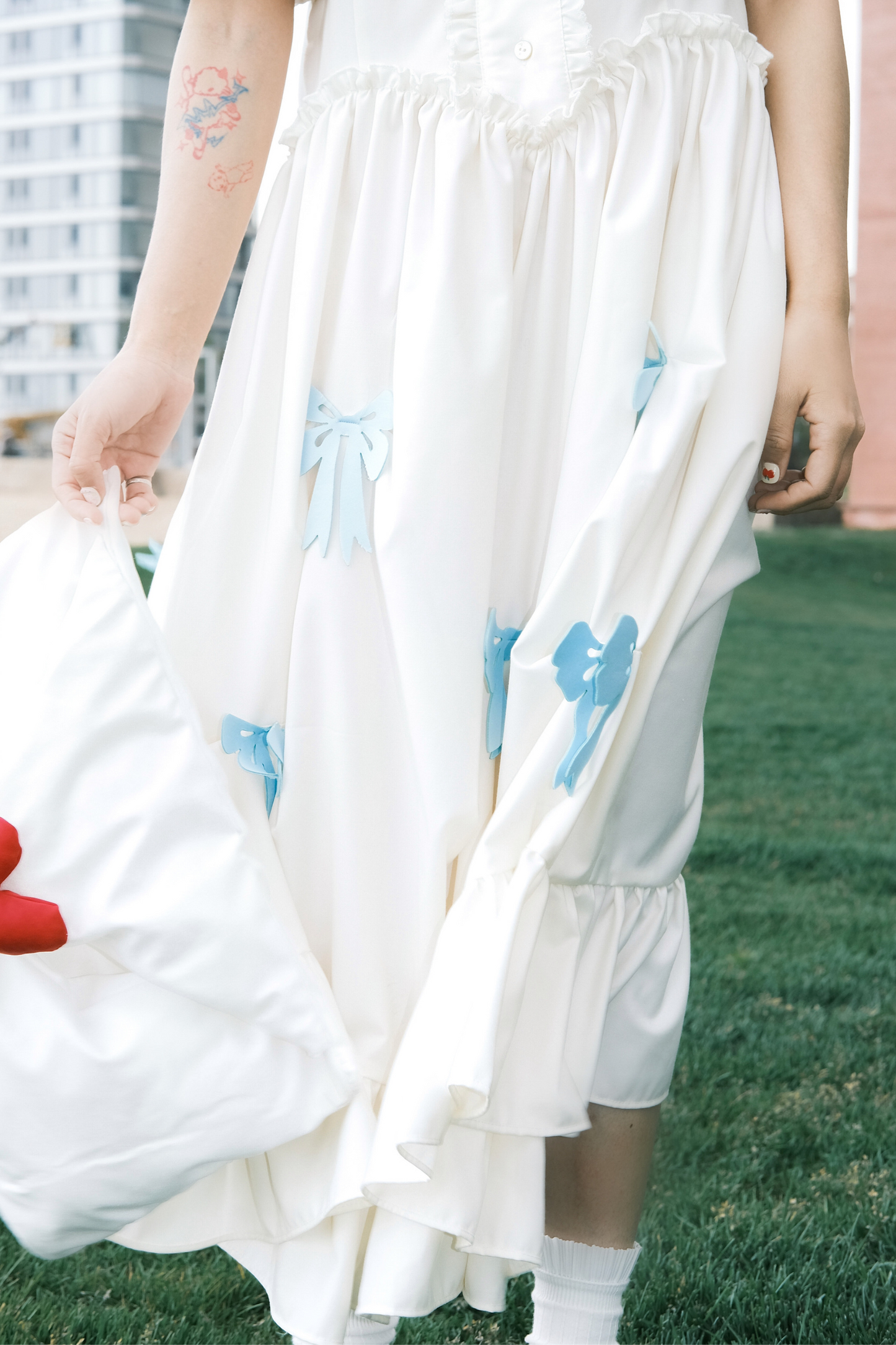 Prinzessinnenkleid mit Ballonärmeln und Schleife