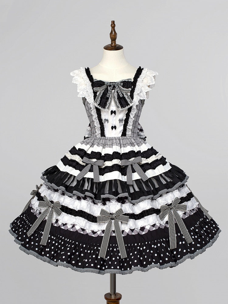 Lolita-Kleid mit Schleifenrock und schwarzem Stufenkleid mit weißen Oreo-Kuchenakzenten
